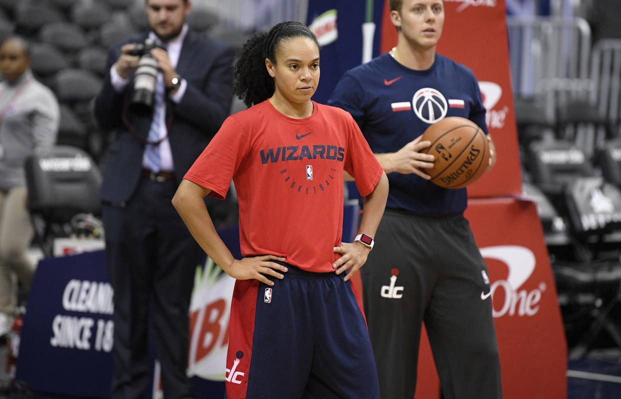 Washington Wizards assistant coach Kristi Toliver is paid significantly less than other NBA assistant coaches, thanks to the WNBA’s collective bargaining agreement. (AP Photo/Nick Wass)