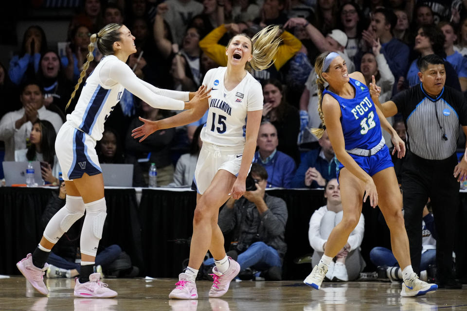 Villanova's Bella Runyan, left, and Brooke Mullin (15) react during the first half of a second-round college basketball game against Florida Gulf Coast in the NCAA Tournament, Monday, March 20, 2023, in Villanova, Pa. (AP Photo/Matt Rourke)