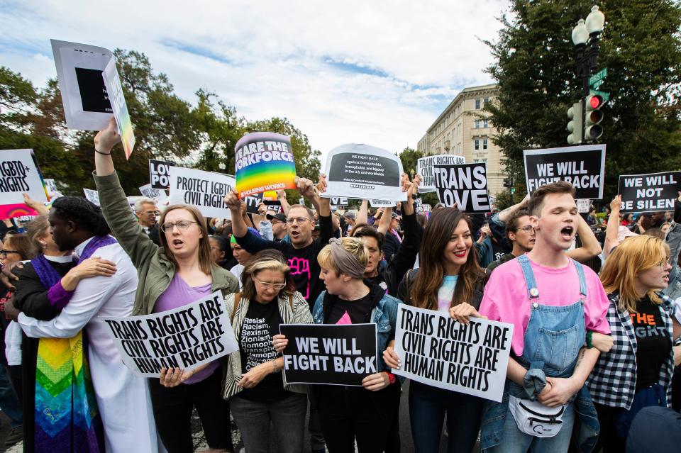 Supporters of LGBT rights protest in front of the U.S. Supreme Court, Tuesday, Oct. 8, 2019, in Washington. The Supreme Court is set to hear arguments in its first cases on LGBT rights since the retirement of Justice Anthony Kennedy.