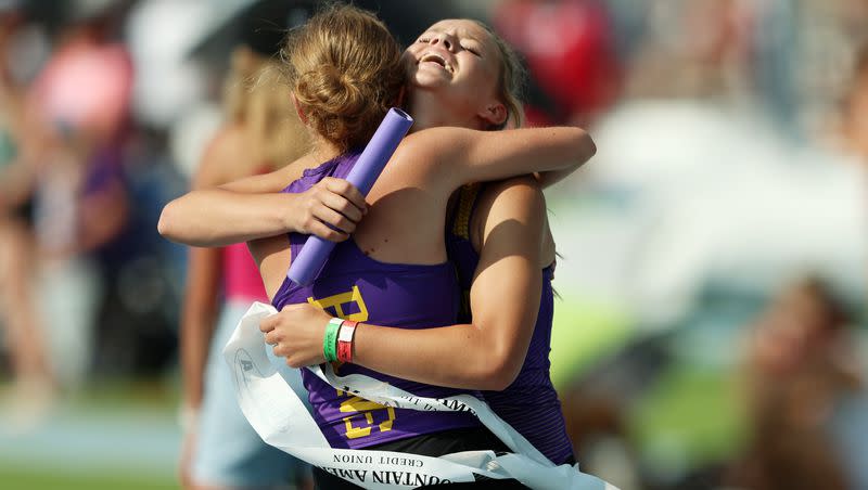 North Summit runners hug as they win the 4x400m race as High School athletes gather at BYU in Provo to compete for the state track and field championships on Saturday, May 20, 2023.