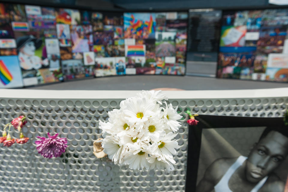 Flowers and signs hang in front of the new interim Pulse nightclub memorial in Orlando, Florida, on June 4, 2018. (Photo: Chris McGonigal/HuffPost)