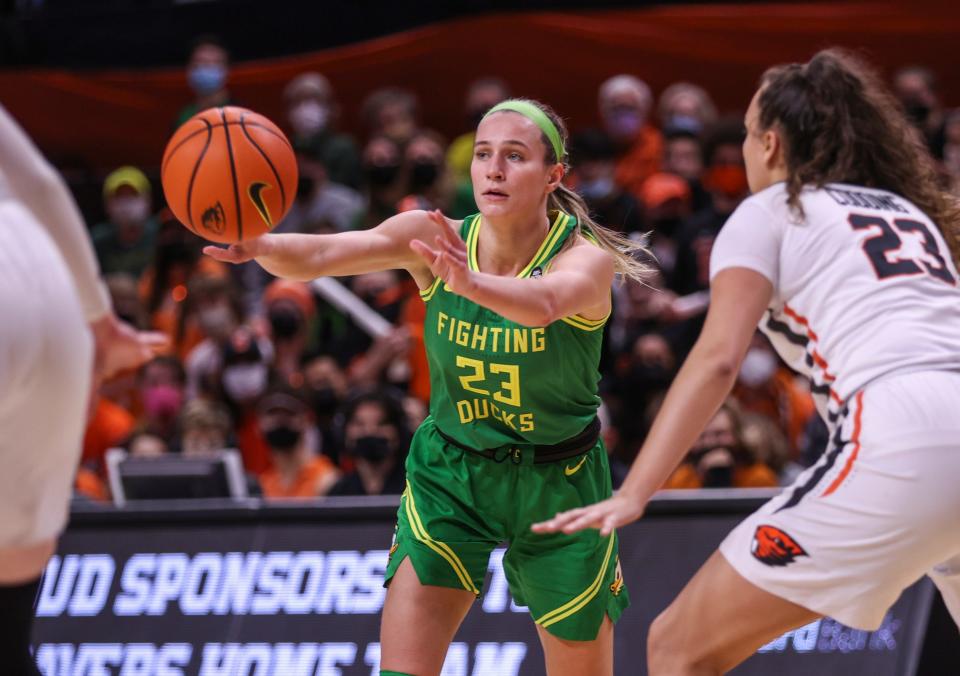 Oregon Guard Maddie Scherr (23) makes a pass during the women's basketball game against Oregon State on Friday, Feb. 11, 2022 at Gill Coliseum in Corvallis, Ore. 