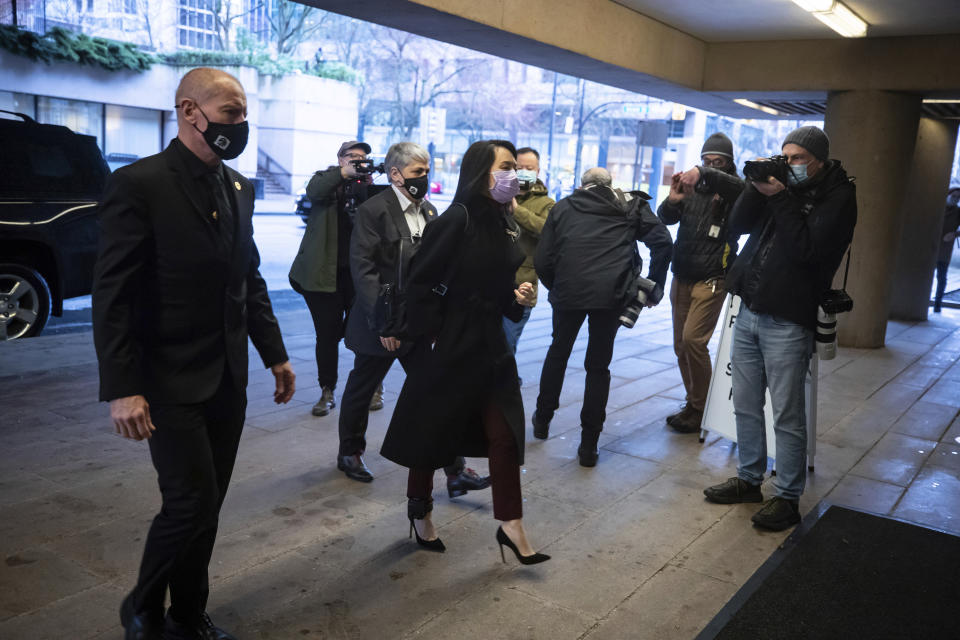 Chief Financial Officer of Huawei, Meng Wanzhou, arrives at British Columbia Supreme Court, in Vancouver, British Columbia, Friday, March 19, 2021. (Darryl Dyck/The Canadian Press via AP)