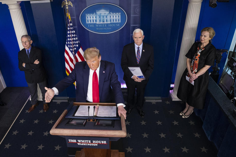 FILE - In this March 26, 2020, file photo President Donald Trump speaks about the coronavirus accompanied by Dr. Anthony Fauci, left, director of the National Institute of Allergy and Infectious Diseases, Vice President Mike Pence, and Dr. Deborah Birx, White House coronavirus response coordinator, in the James Brady Briefing Room in Washington. (AP Photo/Alex Brandon, File)