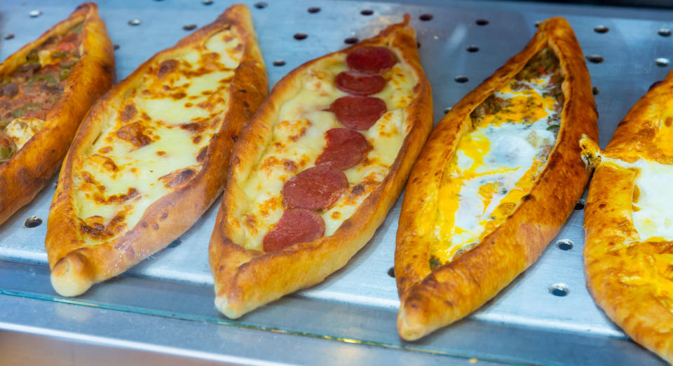 Assorted Turkish foodset. Pide with meat; pide with cheese, pide mix, lachmajun