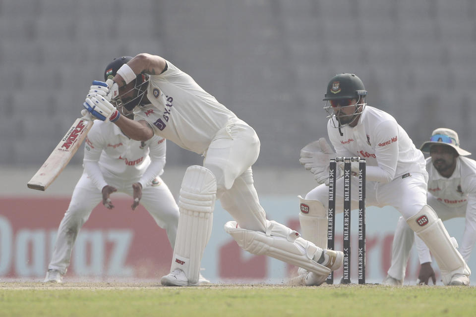 India's Virat Kohli plays a shot on the day two of the second test cricket match Bangladesh between India, in Dhaka, Bangladesh, Friday, Dec. 23, 2022. (AP Photo/Surjeet Yadav)