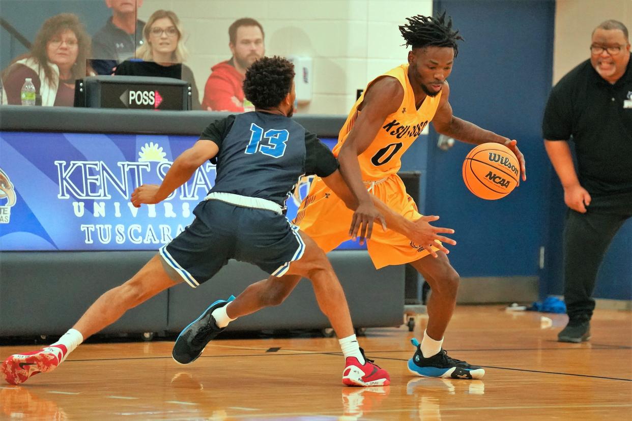 The Golden Eagles DeJuan Lawrence handles the ball against the press against BSC on Sunday.