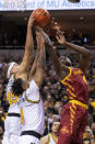 Missouri's Noah Carter, left, blocks the shot of Iowa State's Demarion Watson, right, as DeAndre Gholston, center, defends during the first half of an NCAA college basketball game, Saturday, Jan. 28, 2023, in Columbia, Mo. (AP Photo/L.G. Patterson)