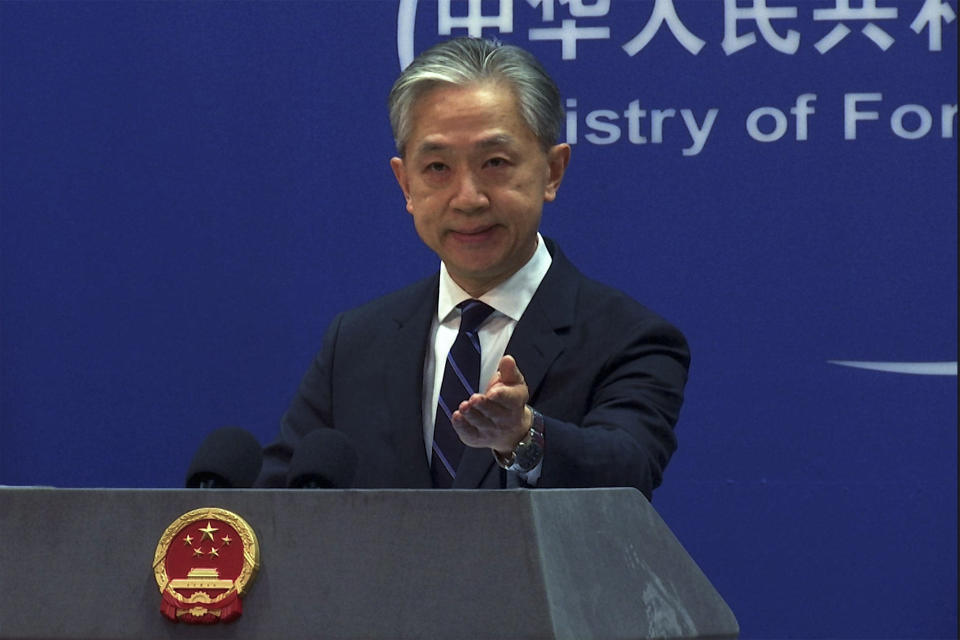 In this image made from video, Chinese Foreign Ministry spokesperson Wang Wenbin speaks during a media briefing at the Ministry of Foreign Affairs office in Beijing, Monday, Feb. 13, 2023. China on Monday said more than 10 U.S. high-altitude balloons have flown in its airspace during the past year without its permission, following Washington's accusation that Beijing operates a fleet of surveillance balloons around the world. (AP Photo/Liu Zheng)