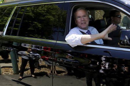 Jeb Bush waves as he departs after speaking to the Greater Salem Chamber of Commerce in Salem, New Hampshire, May 21, 2015. REUTERS/Brian Snyder