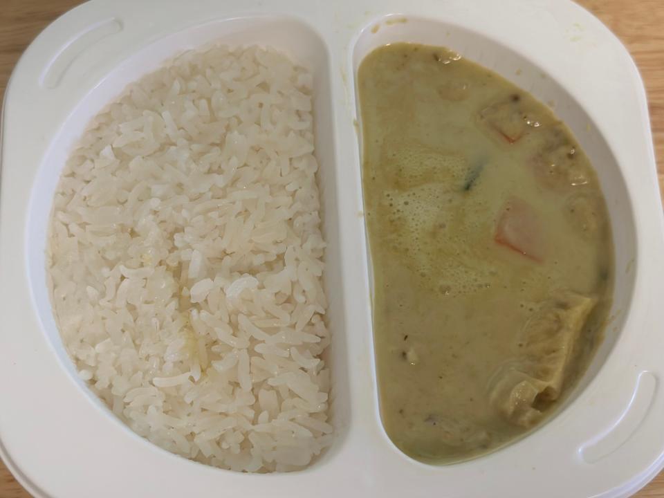 Trader Joe's vegan Thai green curry in a tray after microwaving
