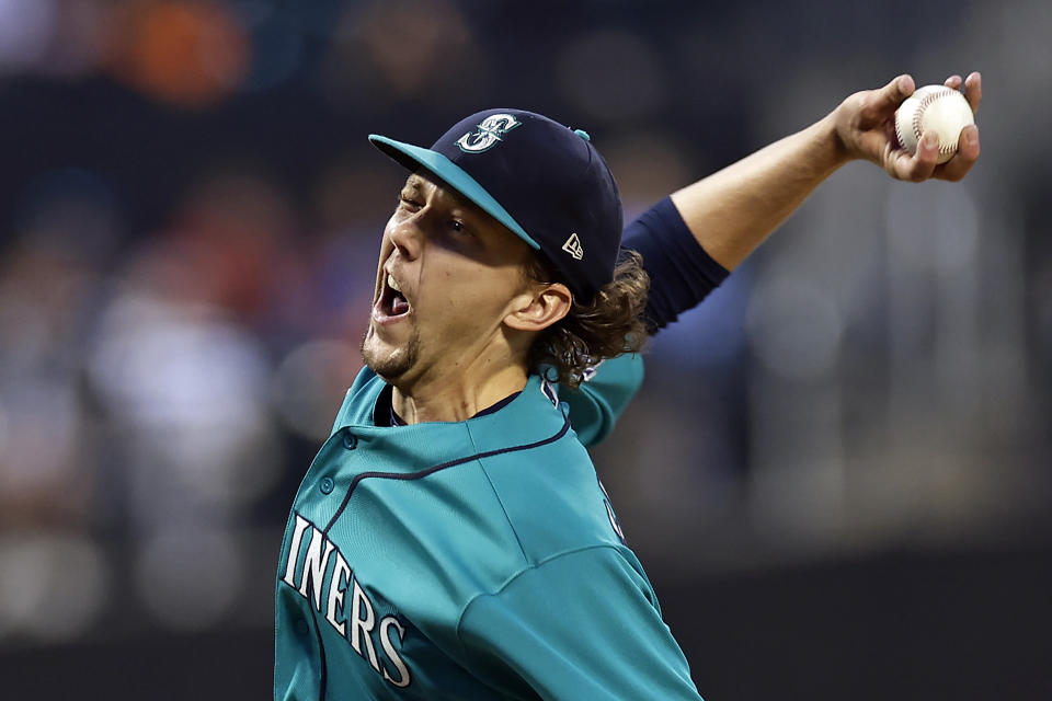 Seattle Mariners pitcher Logan Gilbert throws against the New York Mets during the first inning of a baseball game Friday, Sept. 1, 2023, in New York. (AP Photo/Adam Hunger)