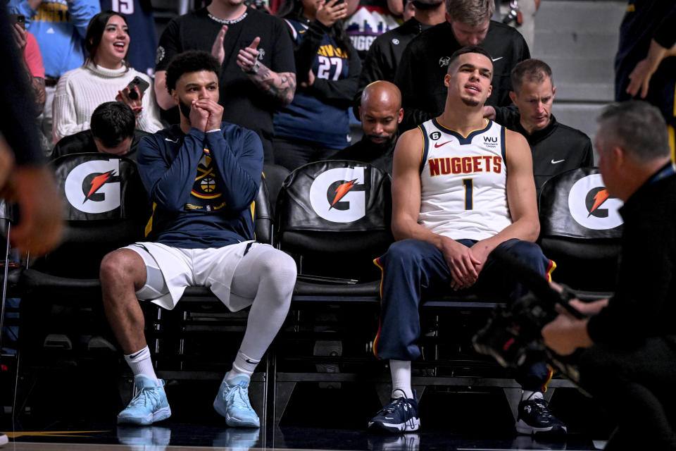 DENVER, CO - OCTOBER 3: Jamal Murray (27) and Michael Porter Jr. (1) of the Denver Nuggets prepare to be introduced against the Oklahoma City Thunder before the first quarter on Monday, October 3, 2022. (Photo by AAron Ontiveroz/MediaNews Group/The Denver Post via Getty Images)