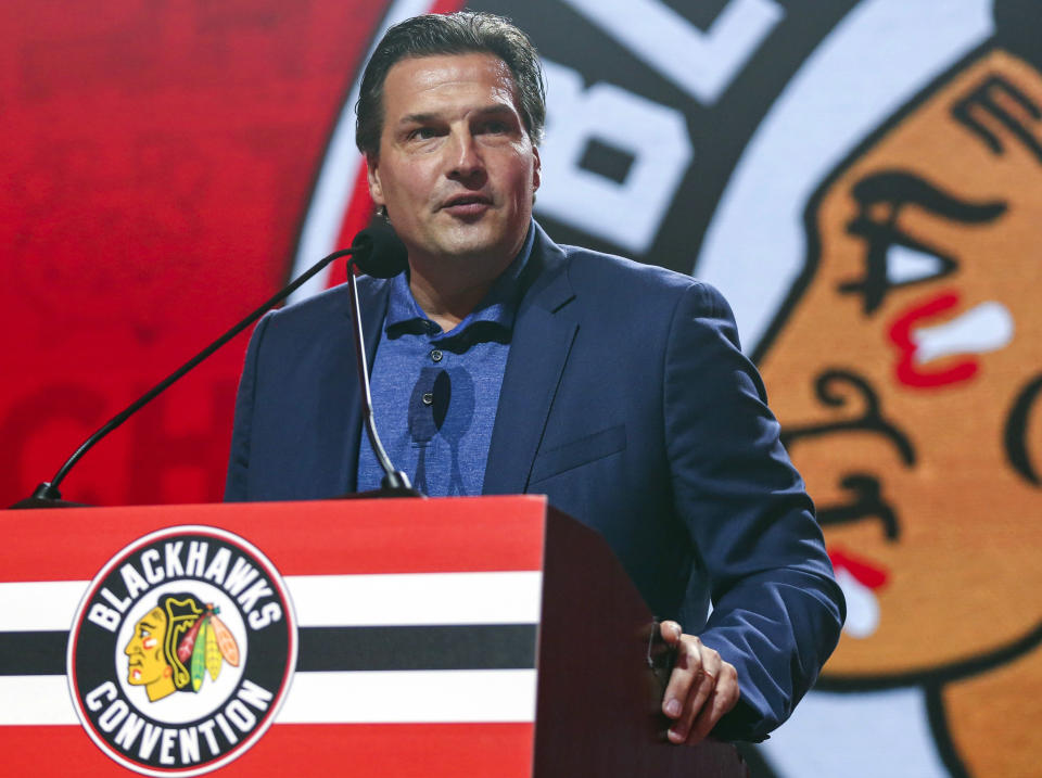 FILE - Former Chicago Blackhawks player Eddie Olczyk speaks during the NHL hockey team's convention in Chicago, July 26, 2019. Former Blackhawks forwards Olczyk, Marian Hossa and Patrick Sharp have agreed to help the team in its search for a new general manager. (AP Photo/Amr Alfiky, File)