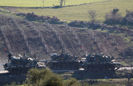 Turkish Army tanks are seen near the Turkish-Syrian border in Kilis province, Turkey January 31, 2018. REUTERS/Osman Orsal