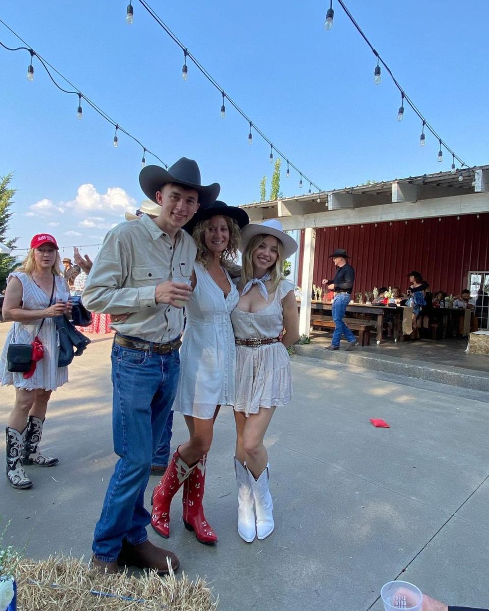 Sydney Sweeney at her mother’s birthday party, which featured MAGA-style hats (Trent Sweeney / Instagram)