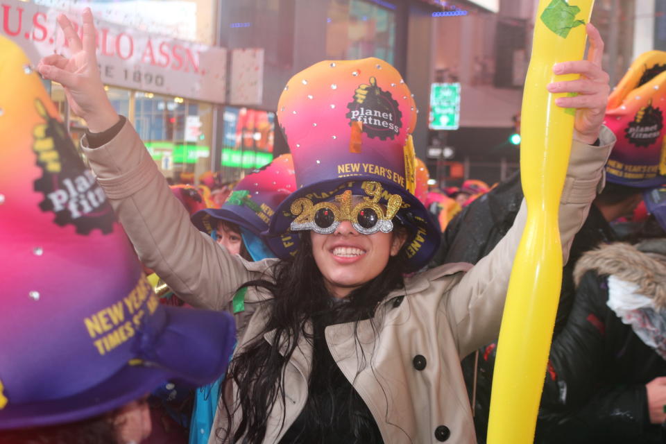 TIMES SQUARE, NEW YORK, UNITED STATES - 2019/01/01: A Participant seen wearing 2019 glasses during the New Year's Eve celebrations. Despite all day rain, More than 2 million people participate at the New Year's Eve celebrations at the Times Square. (Photo by Ryan Rahman/SOPA Images/LightRocket via Getty Images)