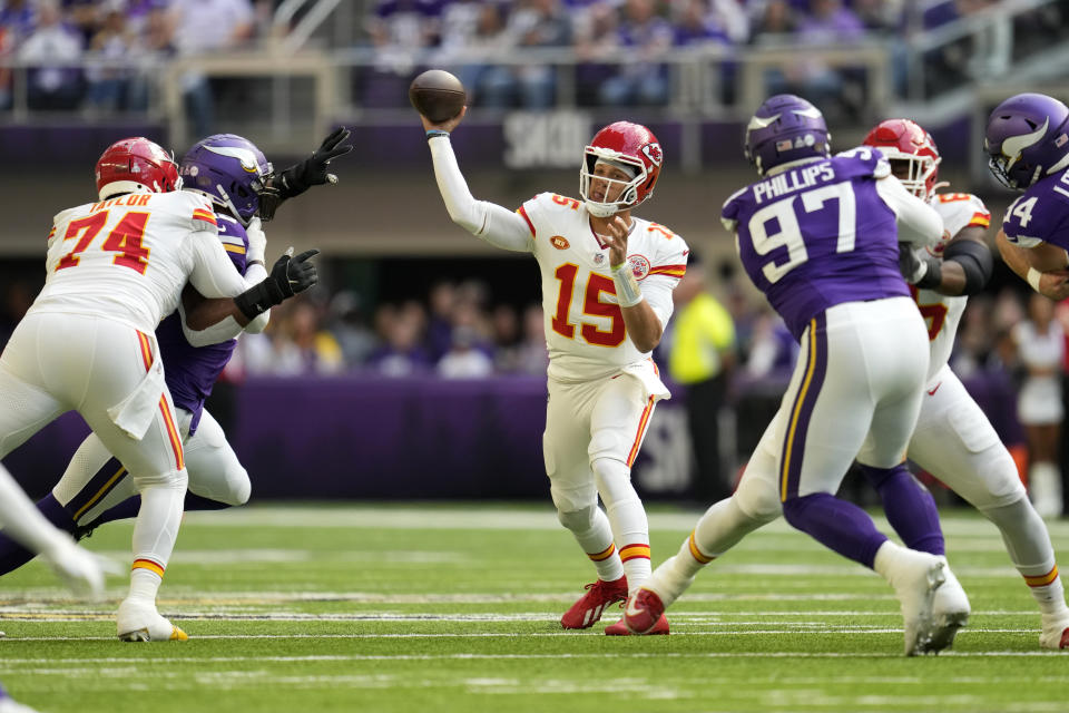 Kansas City Chiefs quarterback Patrick Mahomes (15) throws a pass during the first half of an NFL football game against the Minnesota Vikings, Sunday, Oct. 8, 2023, in Minneapolis. (AP Photo/Abbie Parr)