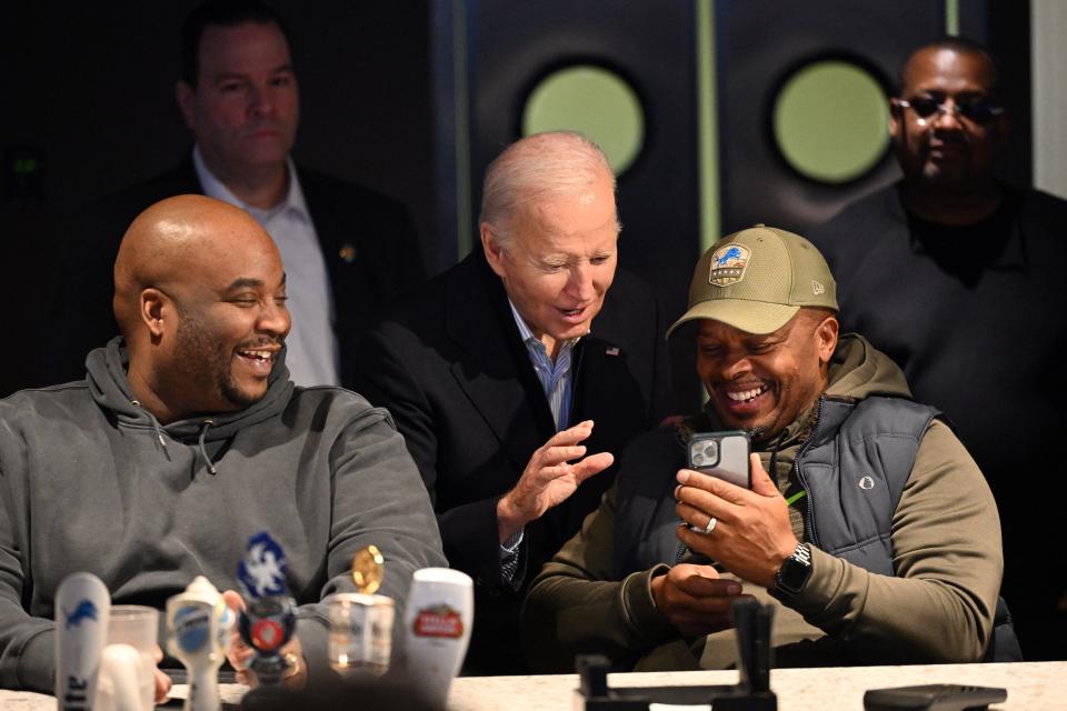 US President Joe Biden speaks with patrons at They Say restaurant in Harper Woods, Michigan, on February 1, 2024.