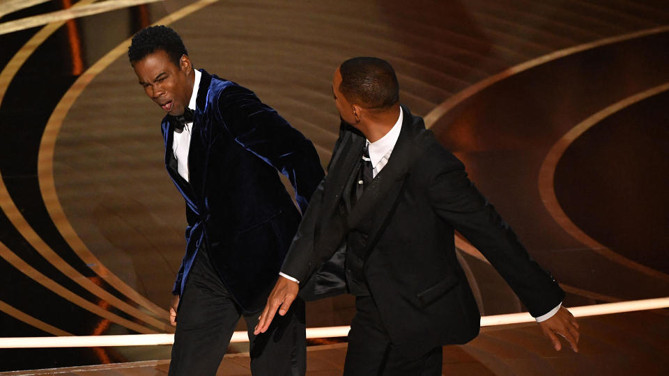 Actor Will Smith slaps comedian Chris Rock onstage during the 94th Academy Awards at the Dolby Theatre in Hollywood, March 27, 2022. / Credit: ROBYN BECK/AFP via Getty Images