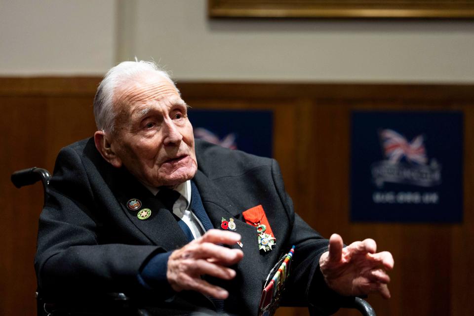 D-Day veteran John Dennett, 99, from Liverpool, who served with the Royal Navy on board LST 322 offloading troops and heavy equipment at Sword Beach, and returning injured troops and prisoners to Portsmouth, pictured during an interview with PA Media at the Union Jack Club in London. Mr Dennett, a recipient of the Legion d'Honneur, joined the Royal Navy at the age of 17 in March 1942. He will travel to France with the assistance of the Spirit of Normandy Trust to take part in commemorations for the 80th anniversary. Picture date: Friday April 26, 2024.