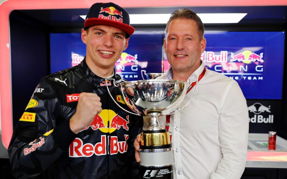 Dutchman Max Verstappen and Red Bull Racing celebrate his first F1 victory with his father Jos Verstappen