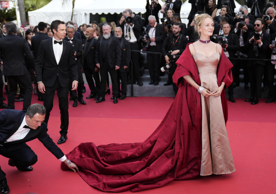 Uma Thurman poses for photographers upon arrival at the opening ceremony and the premiere of the film 'Jeanne du Barry' at the 76th international film festival, Cannes, southern France, Tuesday, May 16, 2023. (Photo by Scott Garfitt/Invision/AP)