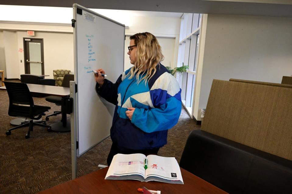 Nicole studies for her final exams at the library in Upstate Medical University (Reuters)