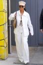 <p>In baggy white high-waisted pants, an oversized white denim jacket, a Balenciaga bag, a newsboy cap, and <a href="https://www.barneys.com/product/alain-mikli-nad-c3-a8ge-sunglasses-505748562.html" rel="nofollow noopener" target="_blank" data-ylk="slk:Alain Mikli x Alexandre Vauthier 'Nadège' sunglasses;elm:context_link;itc:0;sec:content-canvas" class="link ">Alain Mikli x Alexandre Vauthier 'Nadège' sunglasses</a>.</p>