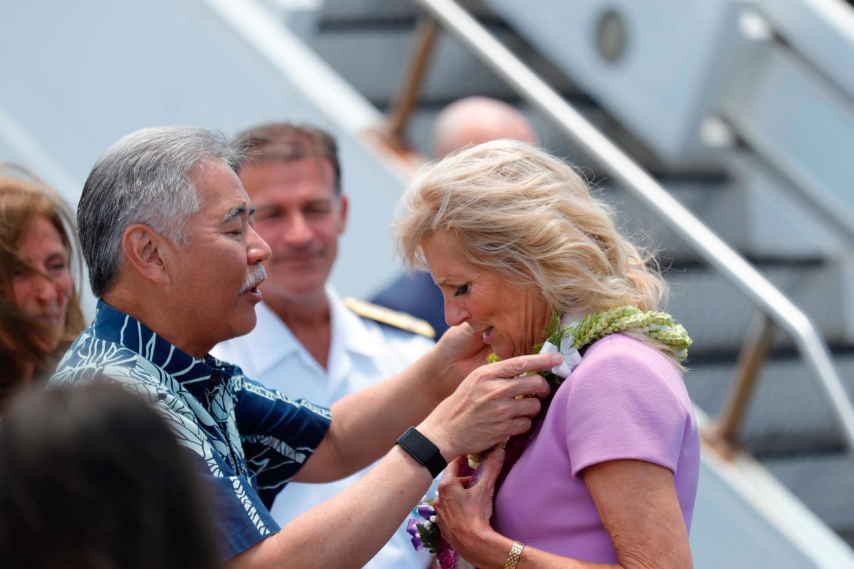 First Lady Jill Biden is heading to the Walter Reed military hospital for a procedure, after getting an object lodged in her foot last weekend on a beach during a series of official events in Hawaii.​ ((Jamm Aquino/Honolulu Star-Advertiser via AP))