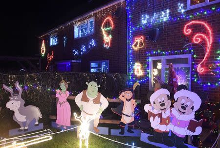 A home is decorated with a display of Christmas of lights in a tradition that has grown over recent years in the small village of Westfield in Sussex, south east England, December 15, 2016. Picture taken on December 15. REUTERS/Toby Melville