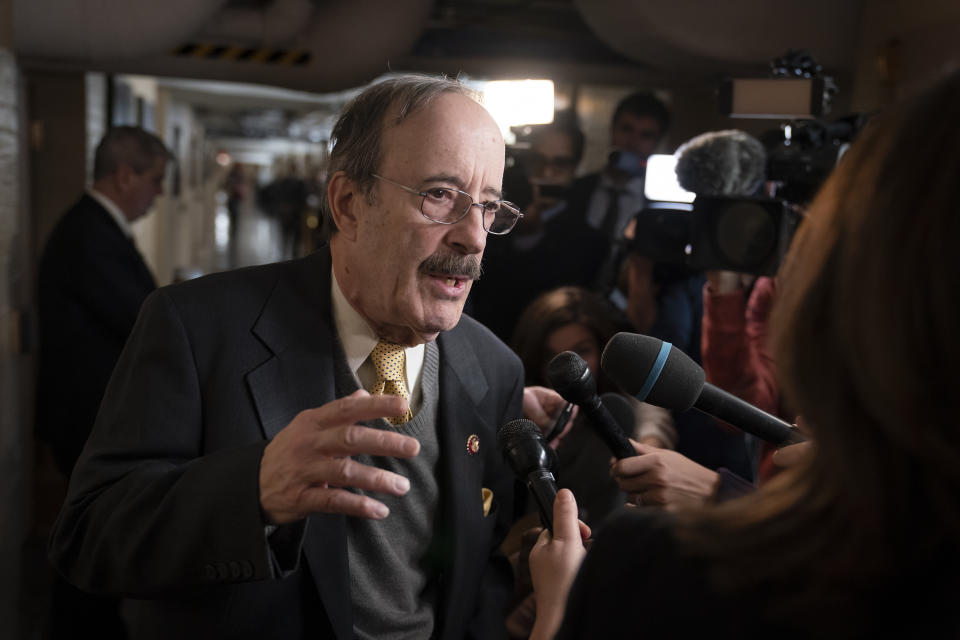 FILE - In this Dec. 17, 2019, file photo House Foreign Affairs Committee Chairman Eliot Engel, D-N.Y., talks to reporters as before he meets with fellow House Democrats at the Capitol in Washington. Amy McGrath and Engel live hundreds of miles apart in states with dramatically different politics. Yet they are both the preferred candidates of the Democratic Party’s Washington establishment as voters in Kentucky and New York decide their congressional primary elections on Tuesday. And both may be in trouble.(AP Photo/J. Scott Applewhite, File)