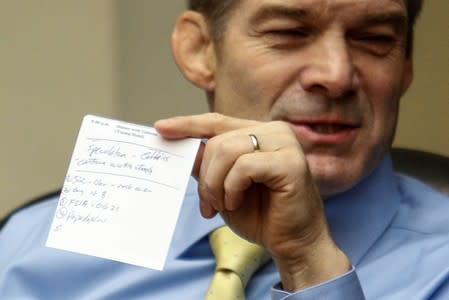 Rep. Jim Jordan (R-OH) displays a list of handwritten notes ahead of the testimony of Anne Schuchat, principal deputy secretary of the Centers for Disease Control and Prevention, in Washington