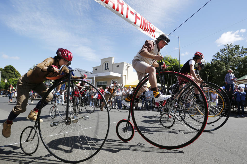 <p>Competitors including Michelle Chia from Singapore (L) starts in the Novice race event, at the National Penny Farthing Championships in the historic town of Evandale, northern Tasmania, Australia, Feb. 18, 2017. (Photo: Barbara Walton/EPA) </p>