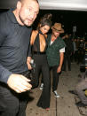 <p>Jenner partied with friends and family at The Nice Guy in West Hollywood for her 20th birthday—though her outfit wasn’t exactly what most would consider to be “family friendly!” Her black, custom-made jumpsuit by Sergio Hudson featured a massive cutout in the middle of her chest, exposing skin from her waist to her neck. She finished the look with a topknot and sophisticated red lips.</p>
