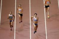 (L-R) Jessica Ennis-Hill of Britain, Nadine Visser of the Netherlands, Katarina Johnson-Thompson of Britain and Anouk Vetter of the Netherlands compete in the 200 metres event of the women's heptathlon at the 15th IAAF World Championships at the National Stadium in Beijing, China August 22, 2015. REUTERS/Fabrizio Bensch