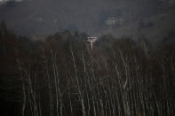 <p>A ski lift tower is seen at the abandoned Alps Ski Resort located near the demilitarized zone separating the two Koreas in Goseong, South Korea, Jan. 17, 2018. (Photo: Kim Hong-Ji/Reuters) </p>