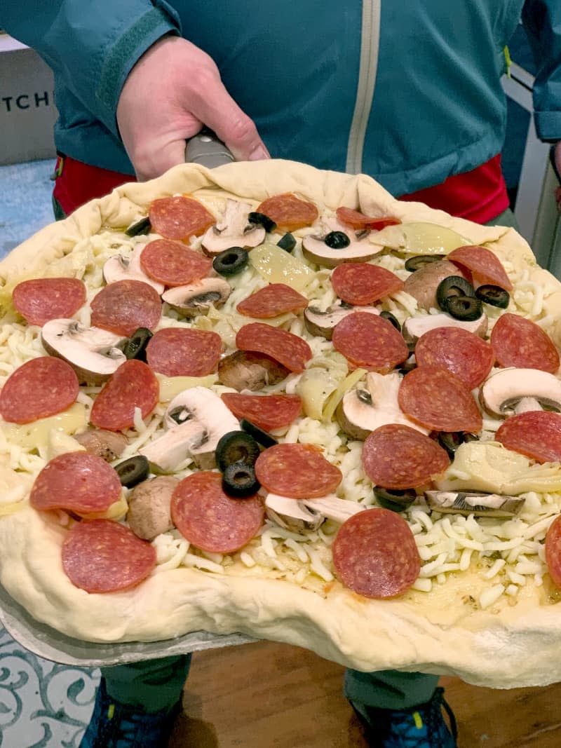 Saturday: Pizza with an olive oil white sauce, black olives, artichoke hearts, mushrooms, and pepperoni, before.