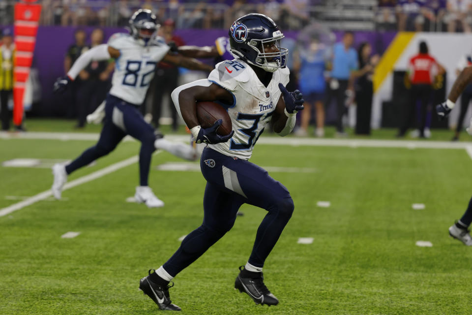 Tennessee Titans running back Tyjae Spears (32) runs the ball for a touchdown in the first half of a preseason NFL football game against the Minnesota Vikings, Saturday, Aug. 19, 2023, in Minneapolis. (AP Photo/Bruce Kluckhohn)