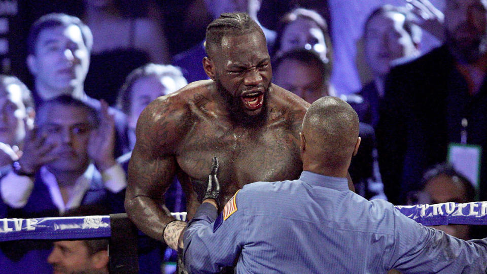 Seen here, Deontay Wilder reacts angrily towards the referee in his fight against Tyson Fury.