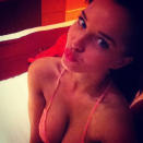 Sexy Helen Flanagan pics: Helen takes advantage of the free heating in her hotel room. [Twitter]