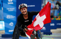 Manuela Schar of Switzerland celebrates after crossing the finish line of the New York City Marathon, winning the women's wheelchair race in Central Park in New York, U.S., November 5, 2017. REUTERS/Brendan McDermid