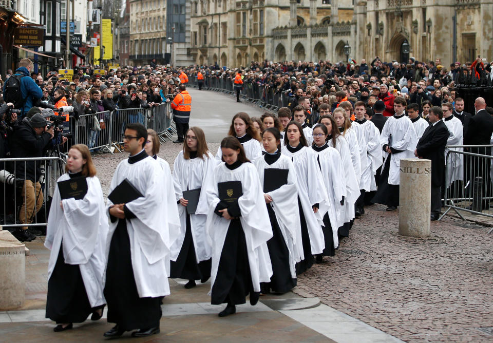 <p>Members of the church choir arrive at Great St Marys Church, where the funeral of theoretical physicist Prof Stephen Hawking is being held, in Cambridge, Britain, March 31, 2018. (Photo: Henry Nicholls/Reuters) </p>