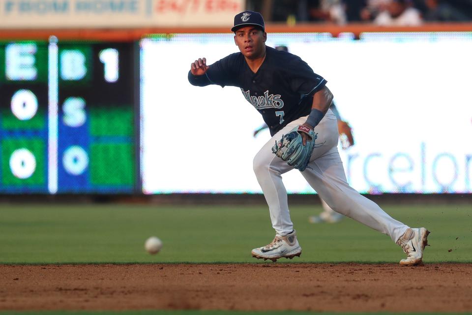 Hooks second baseman J.C. Correa fields a ball during a homestand against the Sod Poodles at Whataburger Field on Thursday, June 22, 2023.