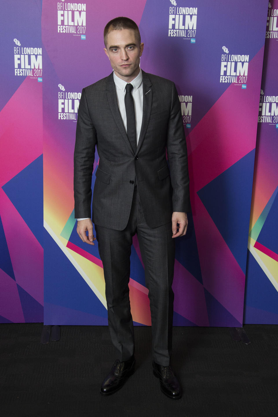 <p>R Patz is back on the circuit, this time donning a fitted grey suit by Dior Homme. <i>[Photo: AP]</i> </p>