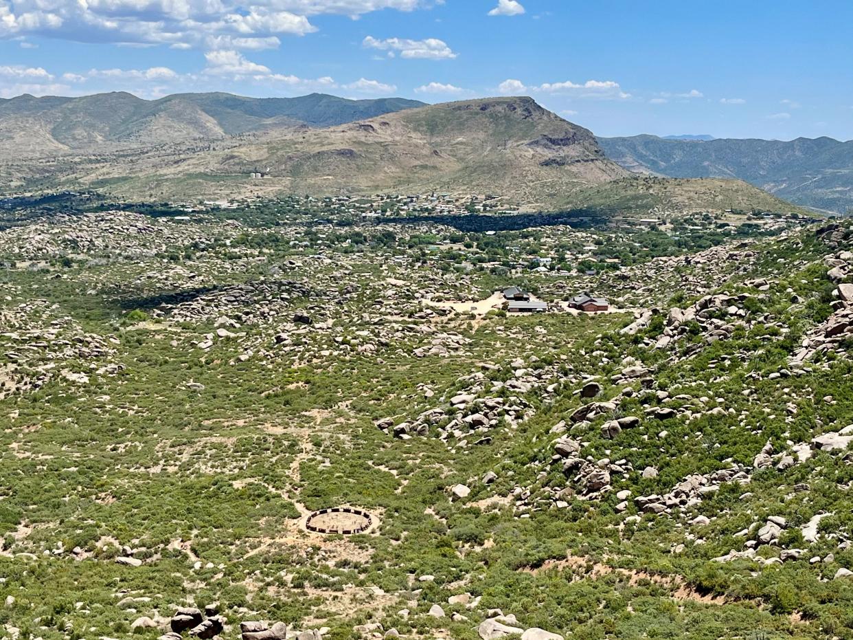 From the top of the 2.85-mile Hotshot Trail at the Granite Mountain Hotshots Memorial State Park, the fatality site where 19 crew members died in the Yarnell Hill Fire on June 30, 2013, can be seen surrounded by barriers below.