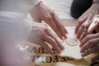 <p>The first Ouija board was <a href="http://mentalfloss.com/article/71923/25-not-so-crabby-facts-about-maryland" rel="nofollow noopener" target="_blank" data-ylk="slk:invented in Baltimore;elm:context_link;itc:0;sec:content-canvas" class="link ">invented in Baltimore</a> by Elijah Bond, who proudly selected its design for his tombstone. Apparently, when Bond asked the board what it wanted to be called, it spelled out "O-U-I-J-A."</p>