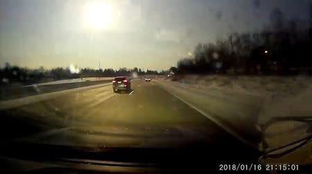A car dash cam captures a view of a meteor near Bloomfield Hills, Michigan, U.S., January 16, 2018 in this still image from video obtained from social media. Youtube Mike Austin/via REUTERS