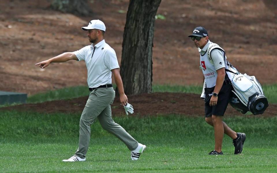 Xander Schauffele points to his ball along the second fairway during second round action of the Wells Fargo Championship at Quail Hollow Club in Charlotte, NC on Friday, May 10, 2024.