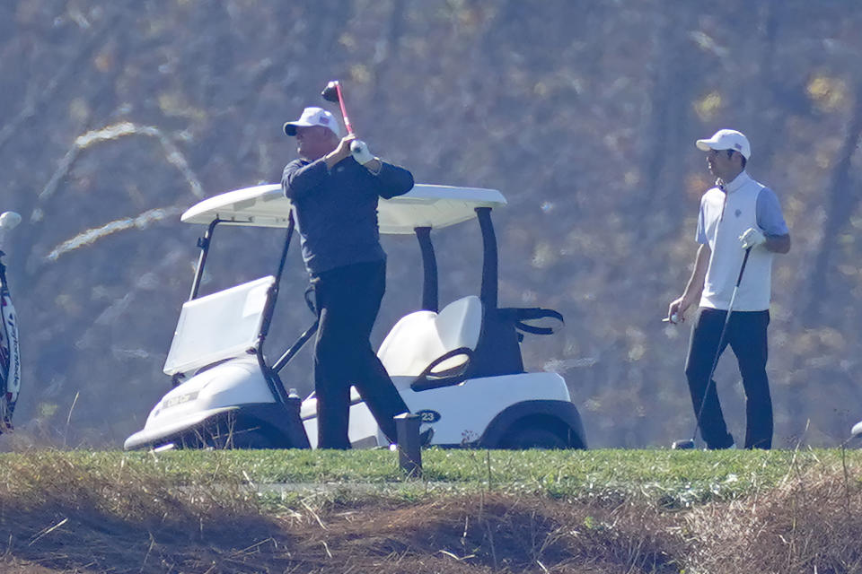 President Donald Trump plays a round of Golf at the Trump National Golf Club in Sterling Va., Sunday Nov. 8, 2020. (AP Photo/Steve Helber)